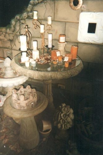 The birdbath with a glass top is not only product we sell, but helps to merchandise other product.