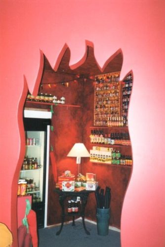 A unique flaming door invites you to enter the Hot Sauce Room.